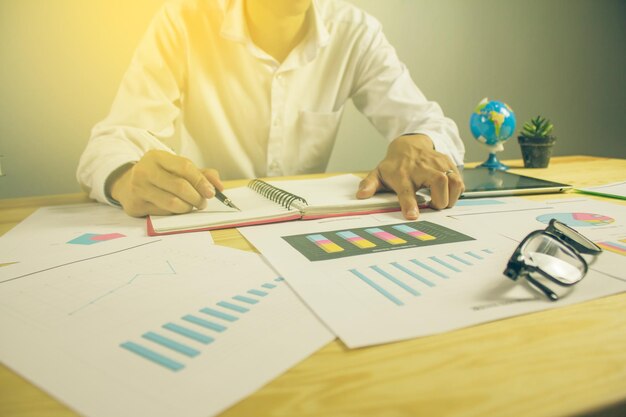 midsection businessman analyzing data desk office 1048944 2812716