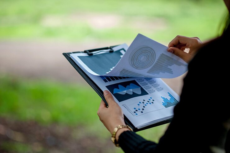 Environmental Baseline Studies midsection woman holding clipboard with papers 1048944 19526659
