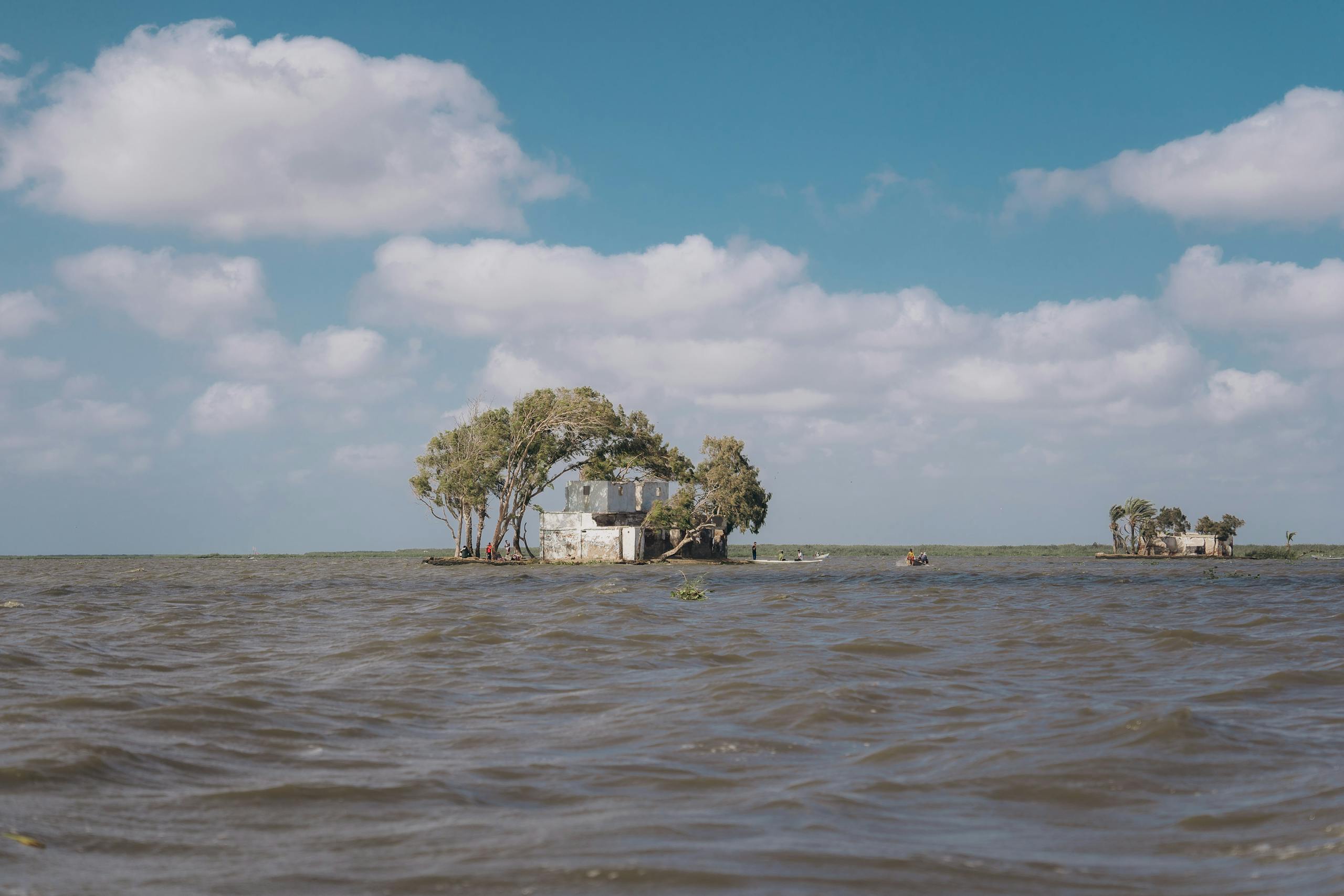 Massa Vitae Toutor Condimentum Lacinia Quis Serene view of trees and ruins by the river under a clear sky in Egypt.
