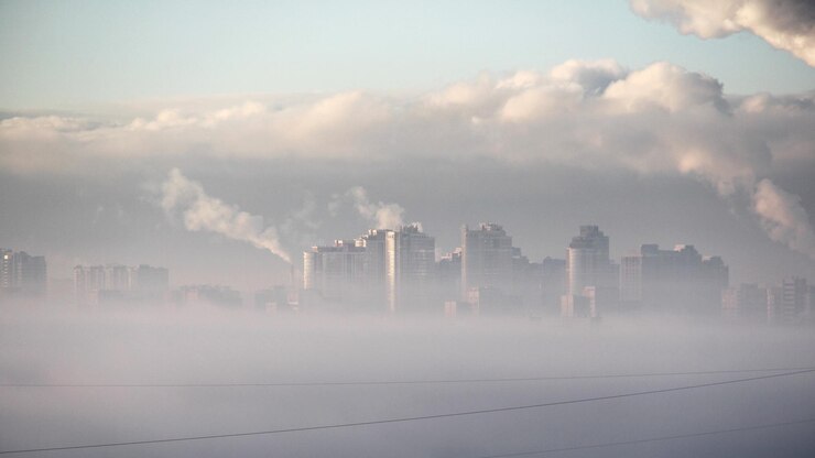 Environmental Baseline Studies smoke emitting from chimney factory against sky 1048944 18535053