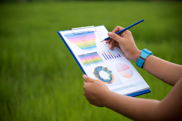 Policy, Planning & Frameworks top view young working woman using laptop reading report graphs charts document work business woman working her desk 10139 75