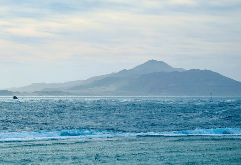 A serene view of the Red Sea and distant mountains in Sharm El-Sheikh, Egypt.